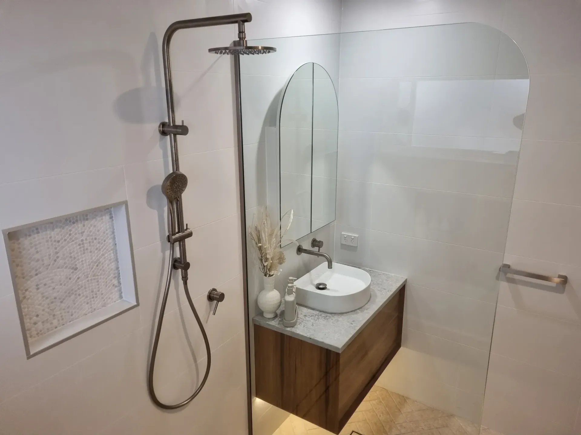 A Bathroom With a Sink, Shower and Mirror — Coastwide Plumbing Solutions in Sippy Downs, QLD