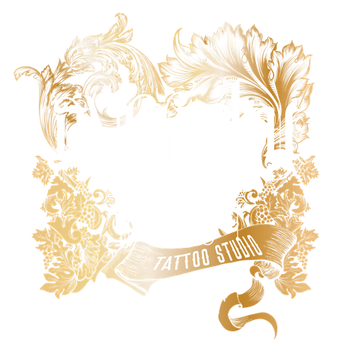 A gold frame with the words tattoo studio on it