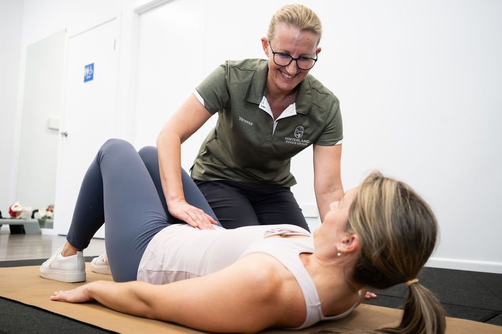 Physiotherapist Assessing the Patient's core— Physiotherapist in Palmwoods, QLD