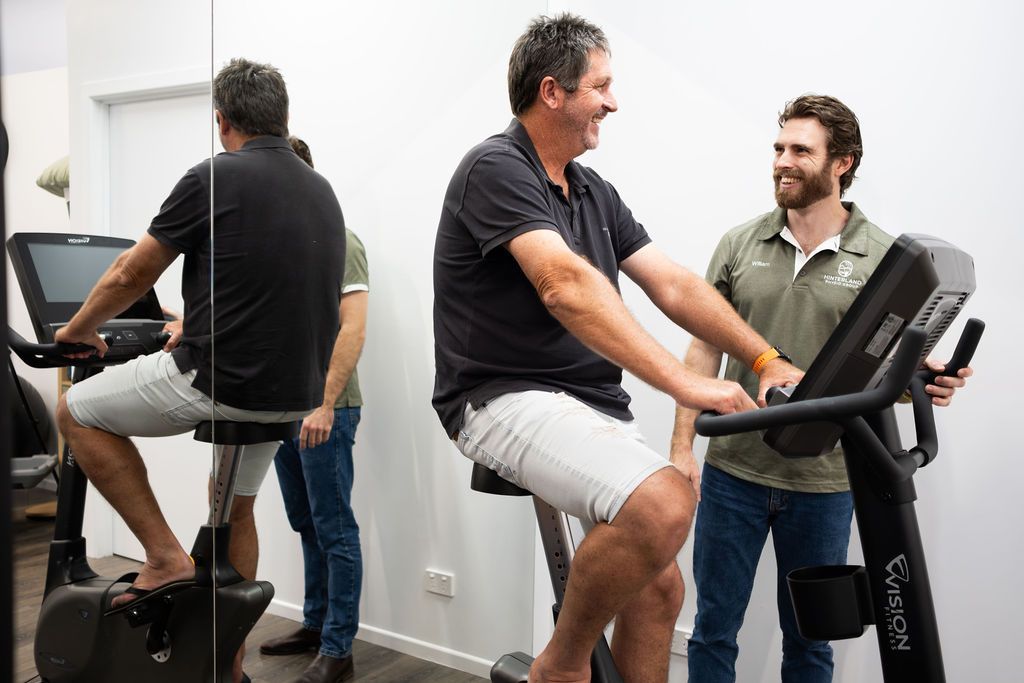 Physiotherapist Assessing man — Physiotherapist in Palmwoods, QLD