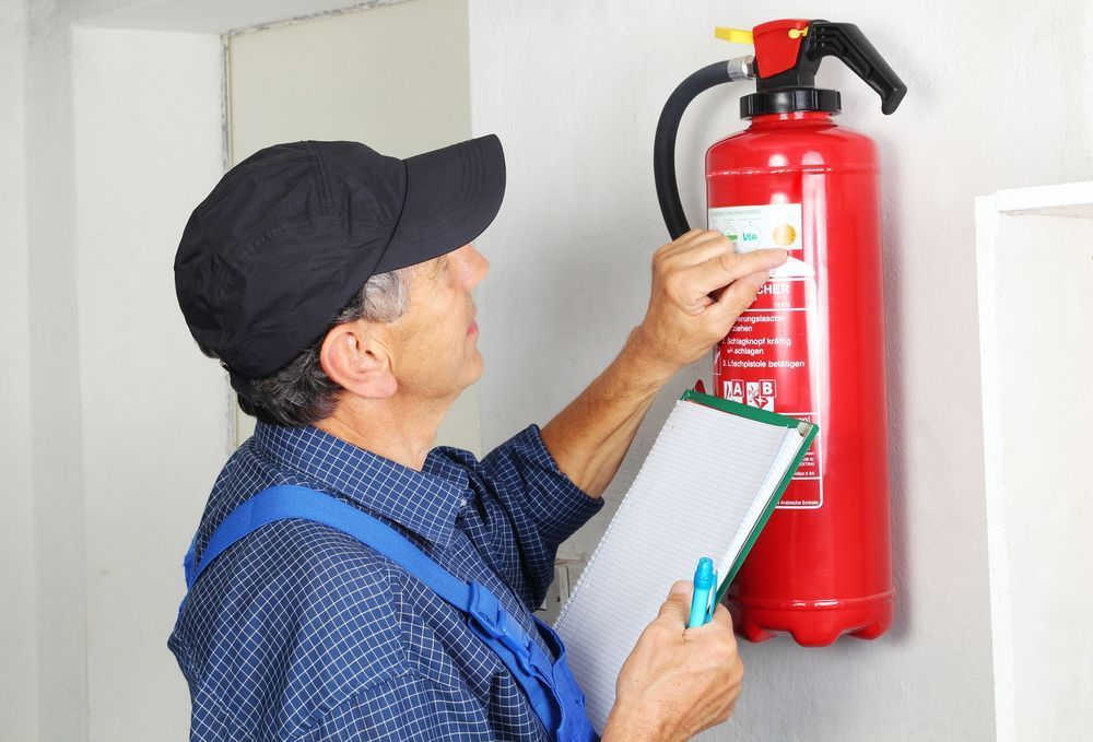 Checking Fire Extinguisher Certification — Fire Safety in Fyshwick, ACT