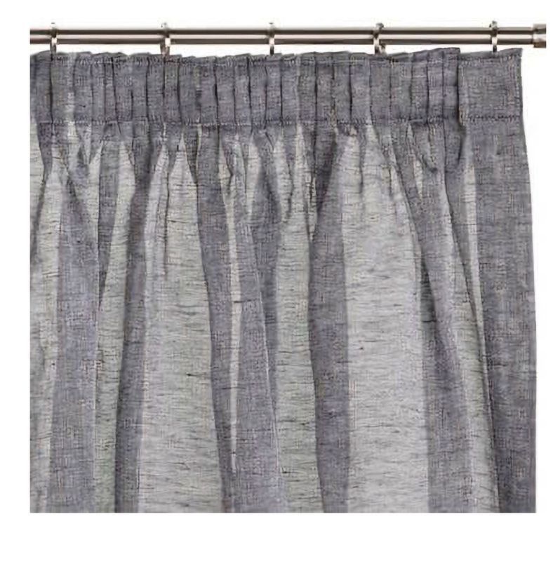 Gray striped curtain panel hanging from a metal rod.