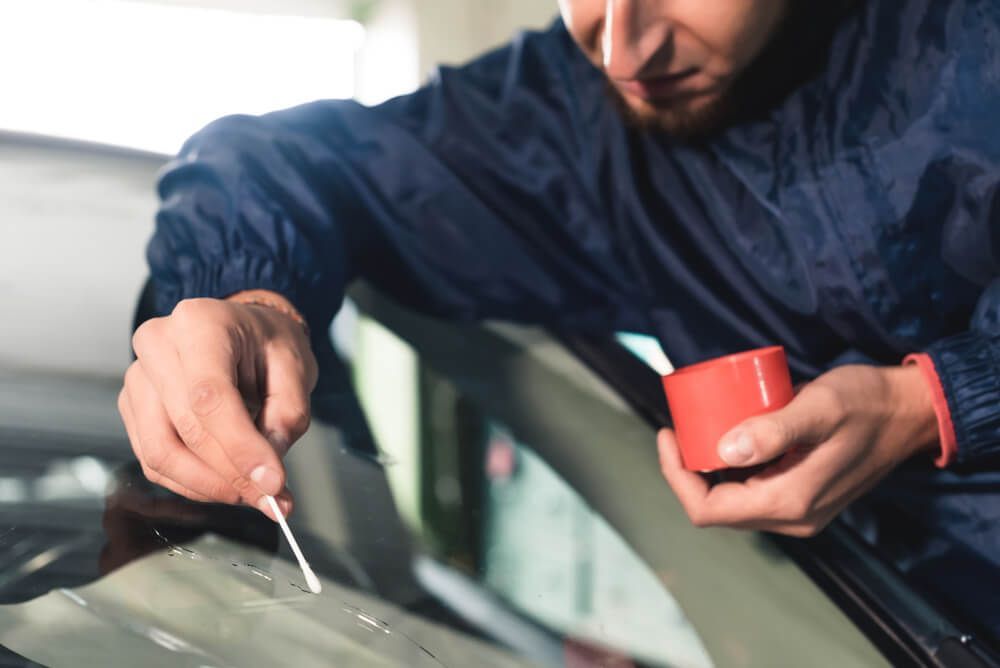 Worker Fixing and Repair Windscreen — Shepparton Radiators & Windscreens in Shepparton, VIC