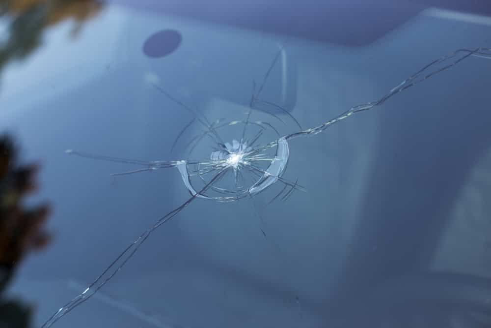 A Close Up of a Broken Windshield With a Hole in It — Shepparton Radiators & Windscreens in Cobram, VIC