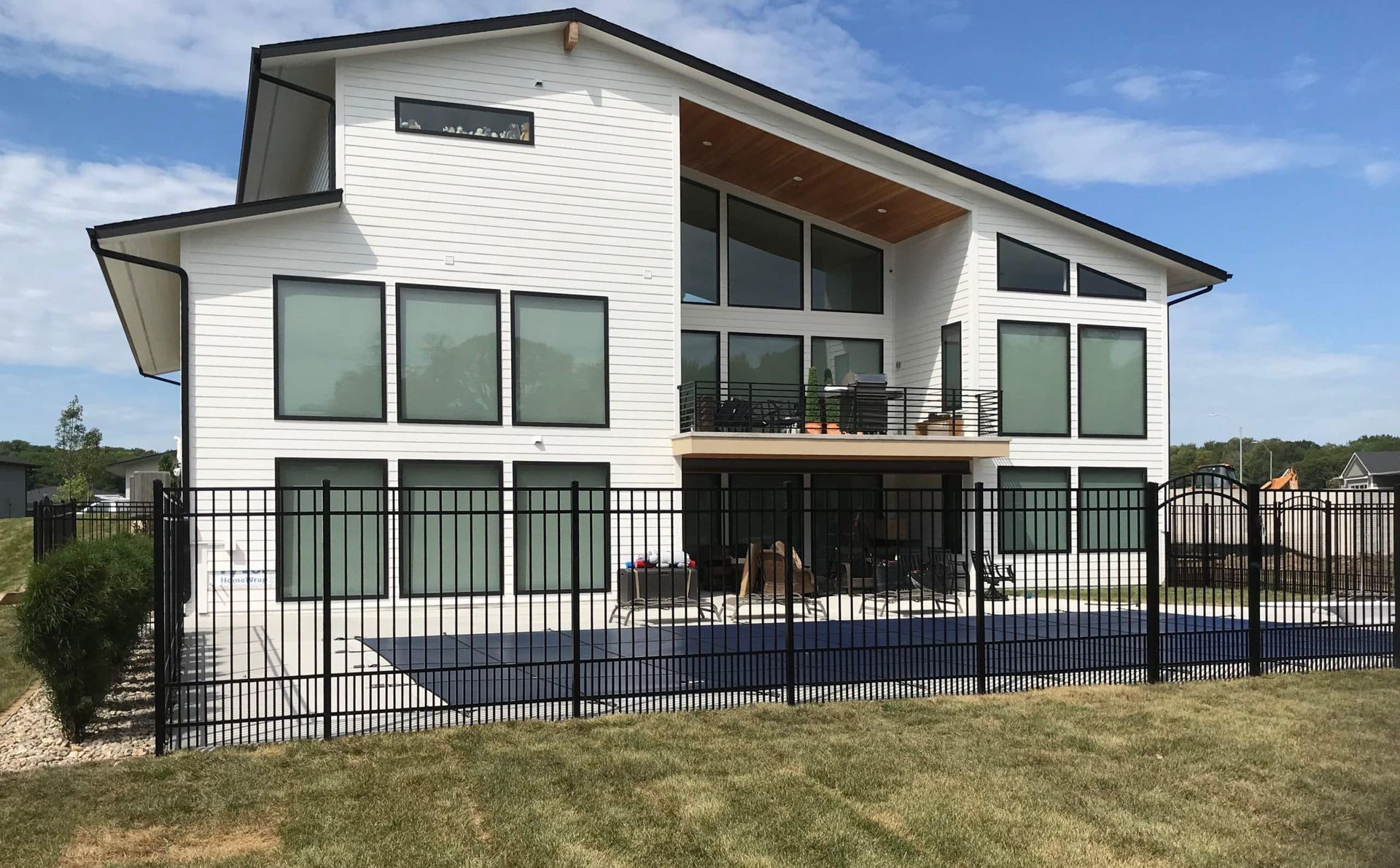 Steel Fencing around A White House | Cambridge, IA | Huber Fencing LLC