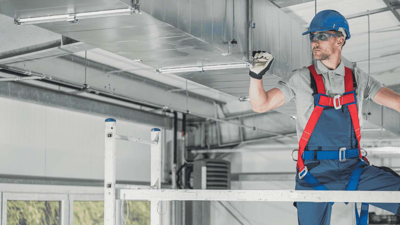 technician working on vents