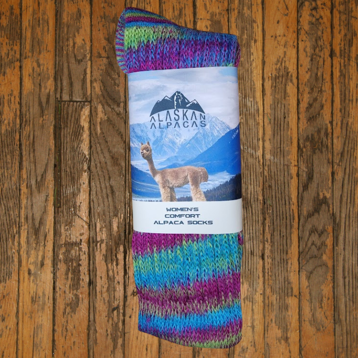 Alpaca wool socks with a colorful pattern. Label reads