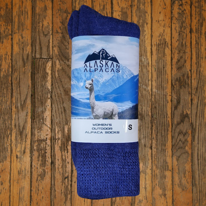 Blue alpaca socks with label: