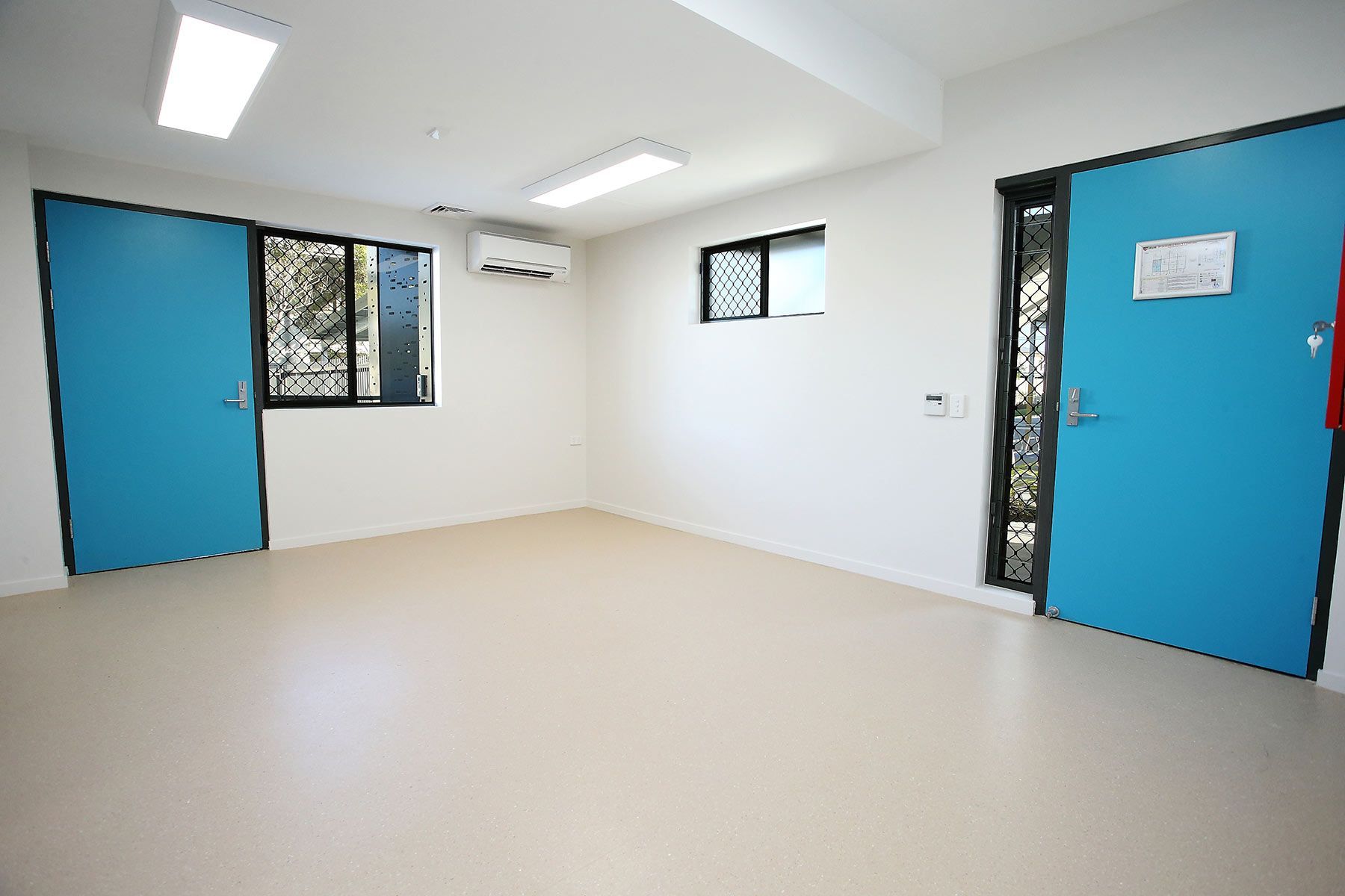 Empty Room With Two Blue Doors — Nick Favot Painting In Bohle, QLD