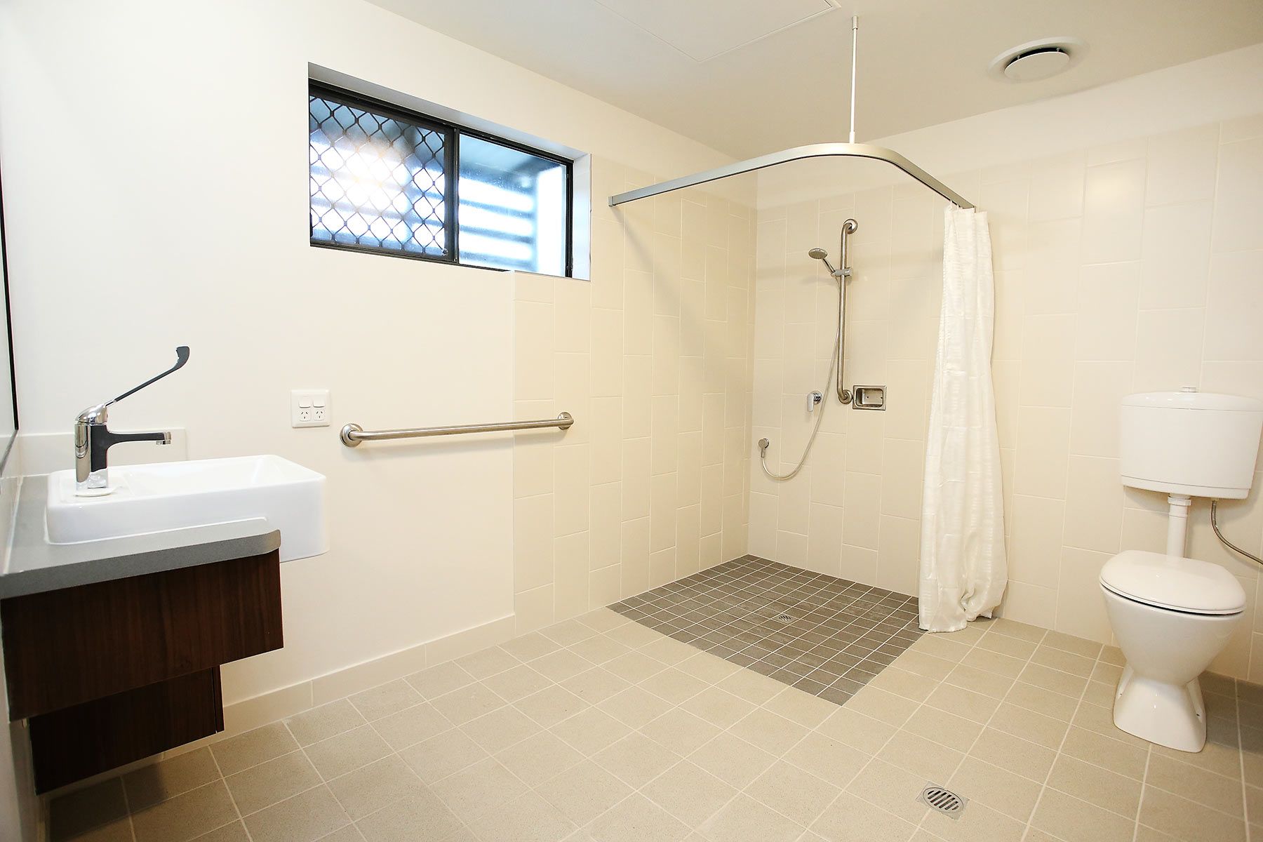 Bathroom With a Roll-in Shower — Nick Favot Painting In Bohle, QLD