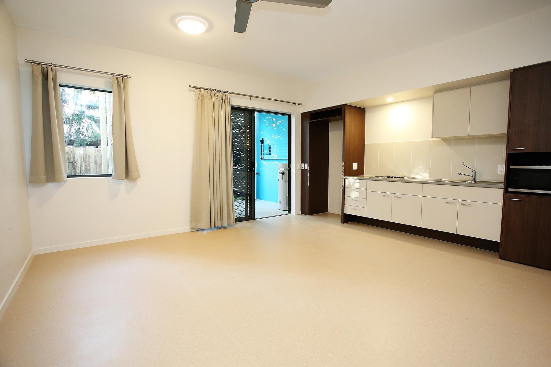 Minimalist Room With Beige Walls and Flooring — Nick Favot Painting In Bohle, QLD