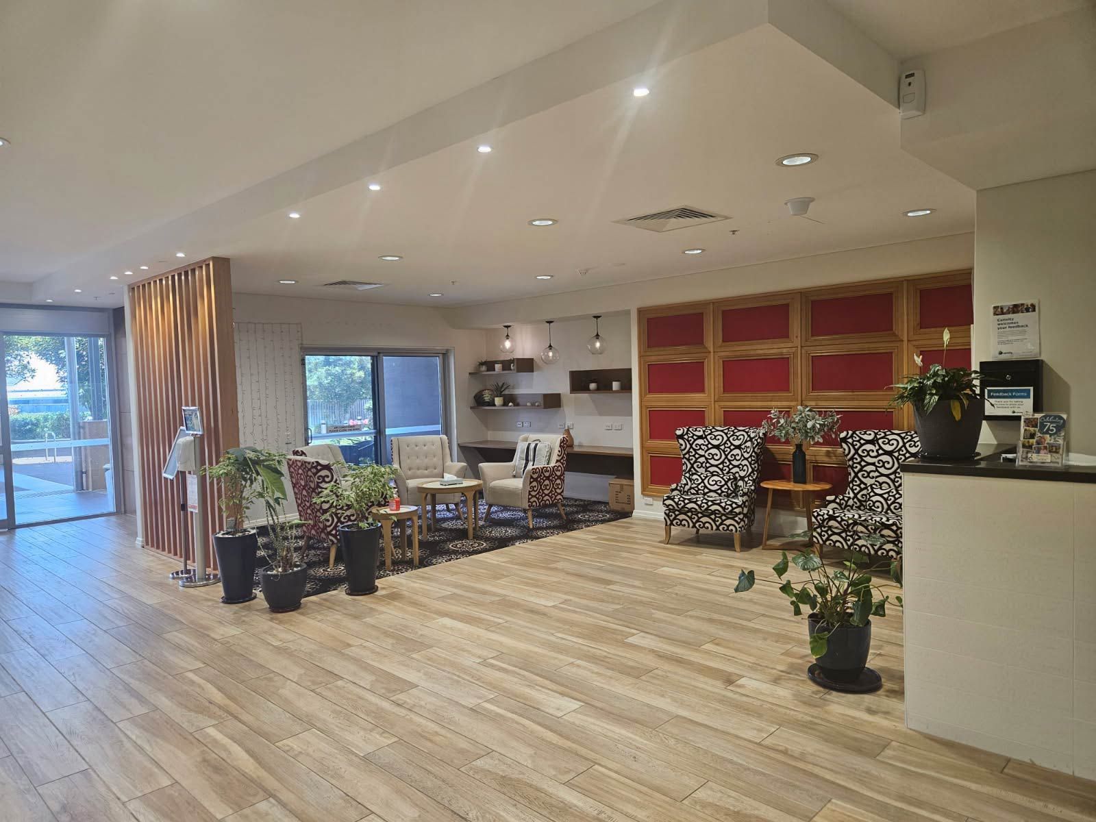 Lobby With Modern Seating and Potted Plants — Nick Favot Painting In Bohle, QLD