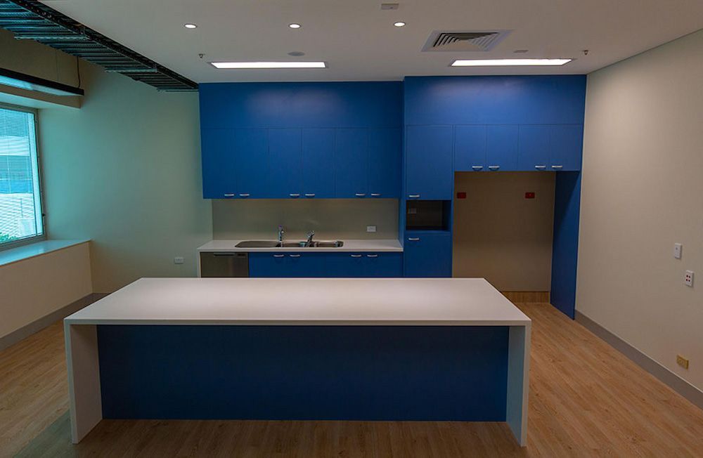 There is a Large Island in the Middle of the Kitchen — Nick Favot Painting in Bohle, QLD