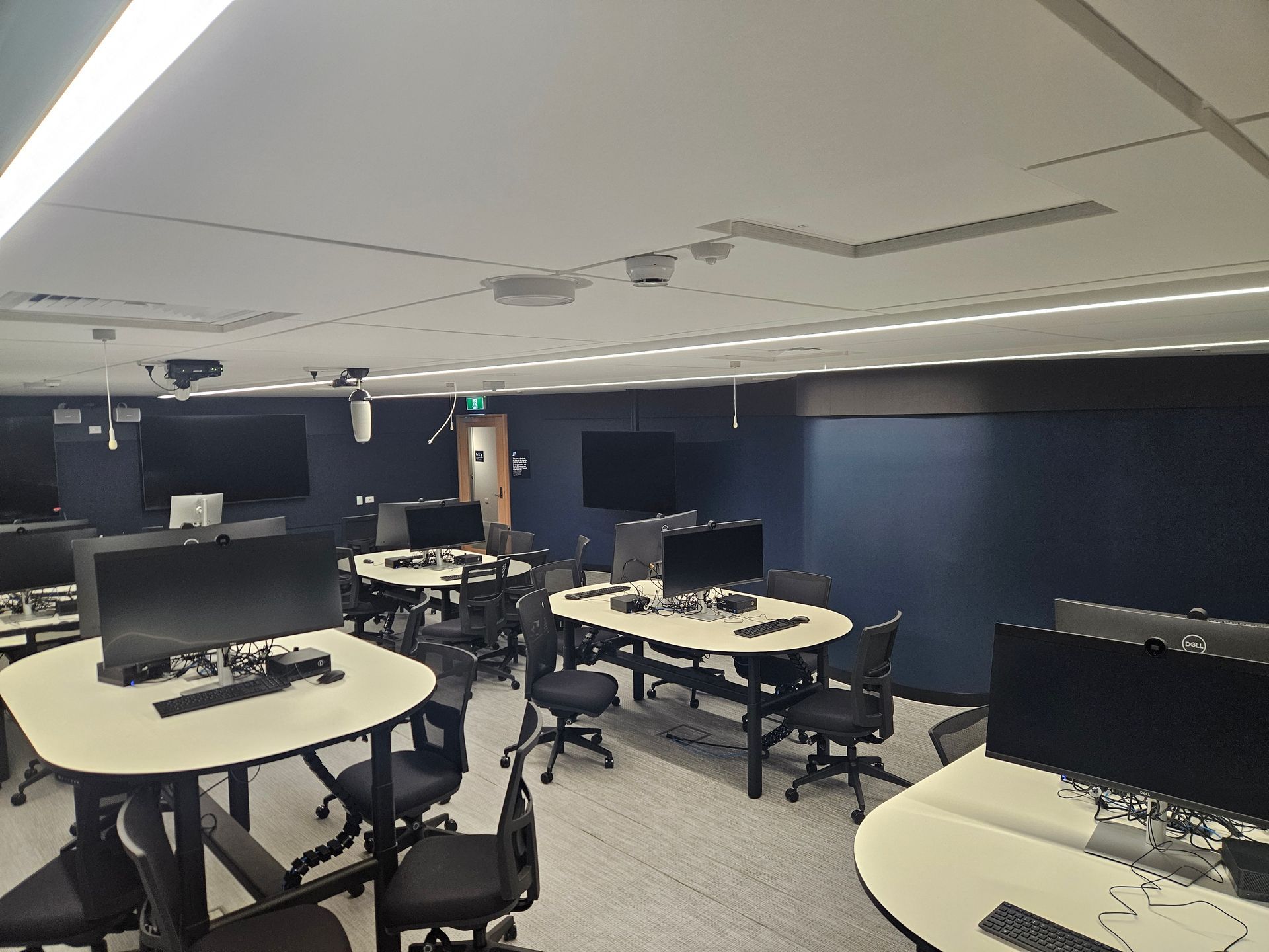 Modern Computer Lab With Oval Desks — Nick Favot Painting In Bohle, QLD