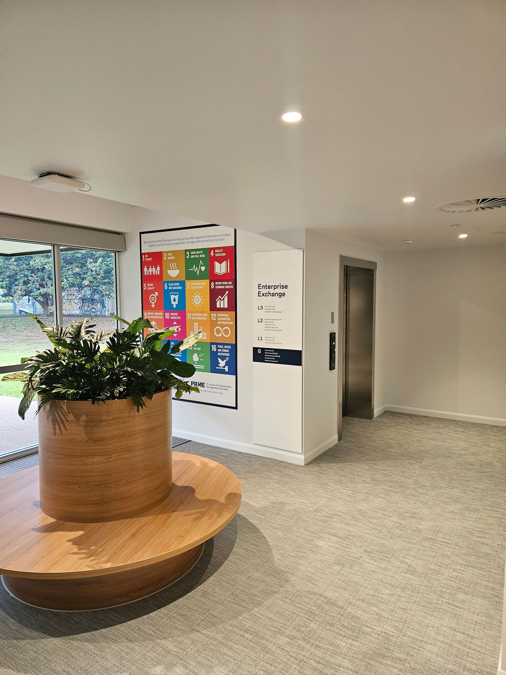 Modern Office Lobby With a Large Wooden Planter — Nick Favot Painting In Bohle, QLD