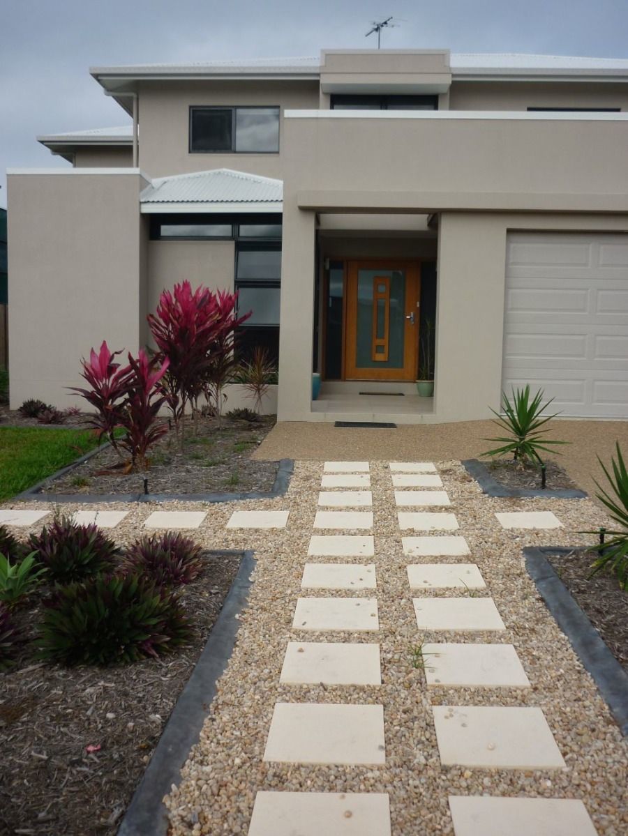 A House With a Walkway Leading to the Front Door — Nick Favot Painting in Bohle, QLD
