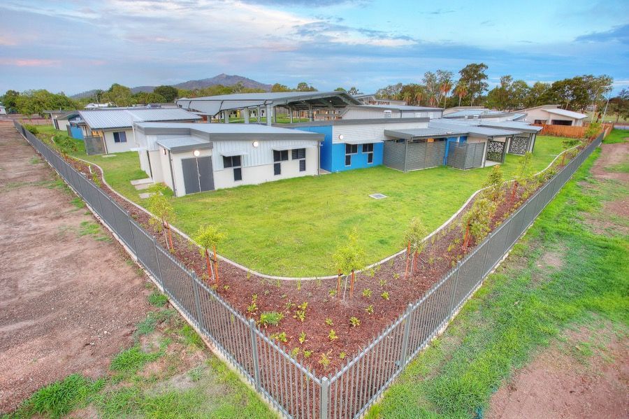 An Aerial View of a House With a Fence Around It — Nick Favot Painting in Bohle, QLD