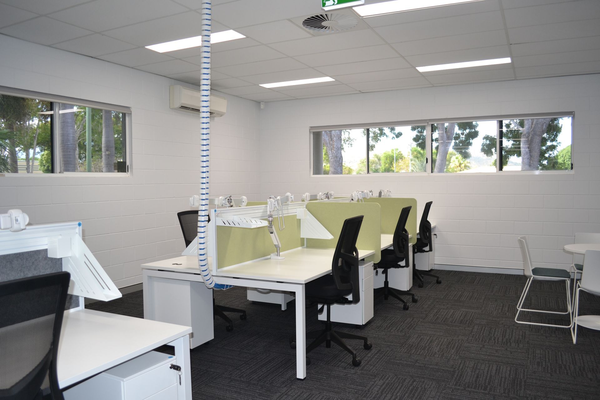 Office With Workstations Featuring Desks, Dividers, and Chairs — Nick Favot Painting In Bohle, QLD