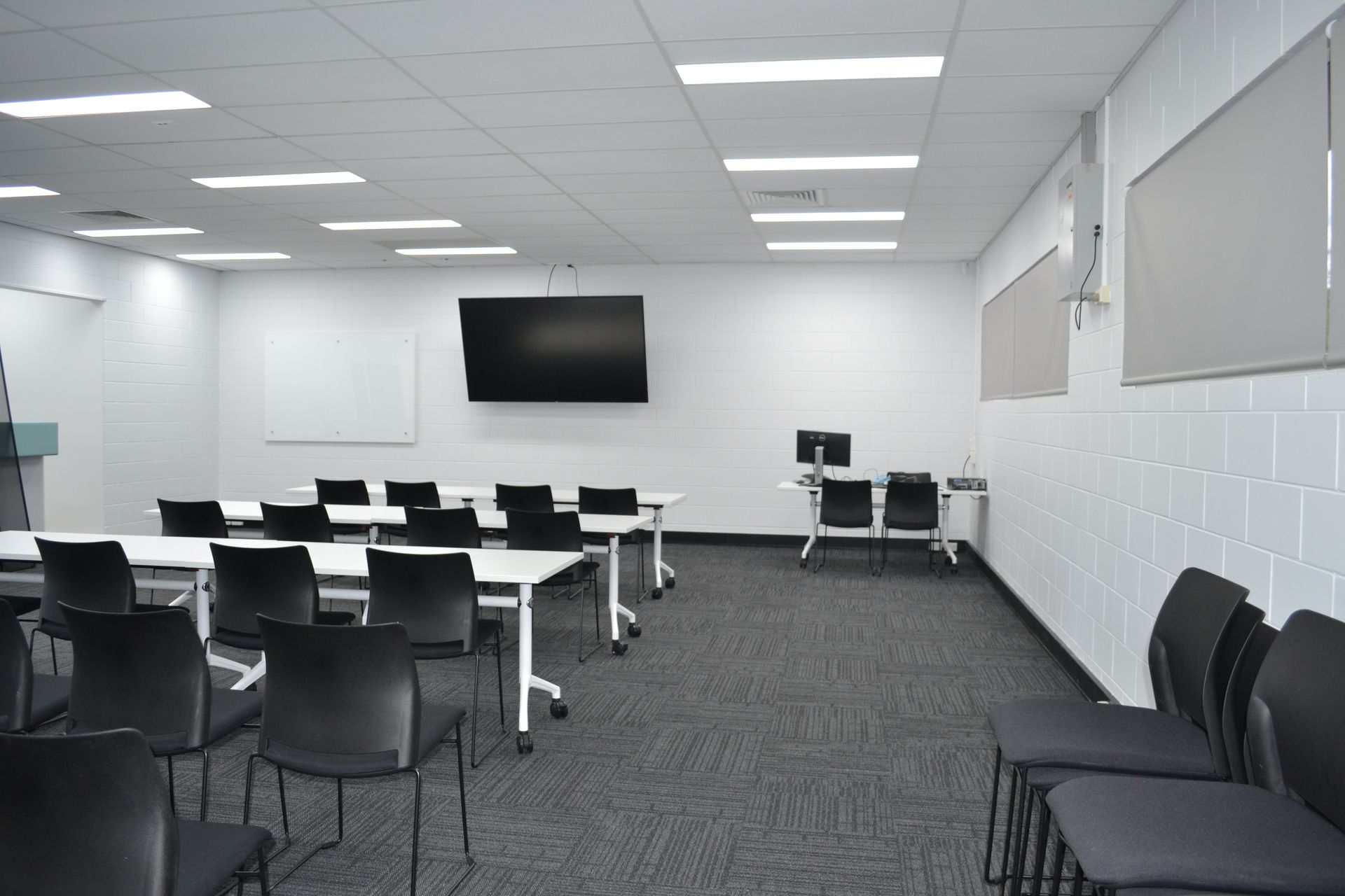 Modern Classroom With Grey Wall and Dark Carpet — Nick Favot Painting In Bohle, QLD