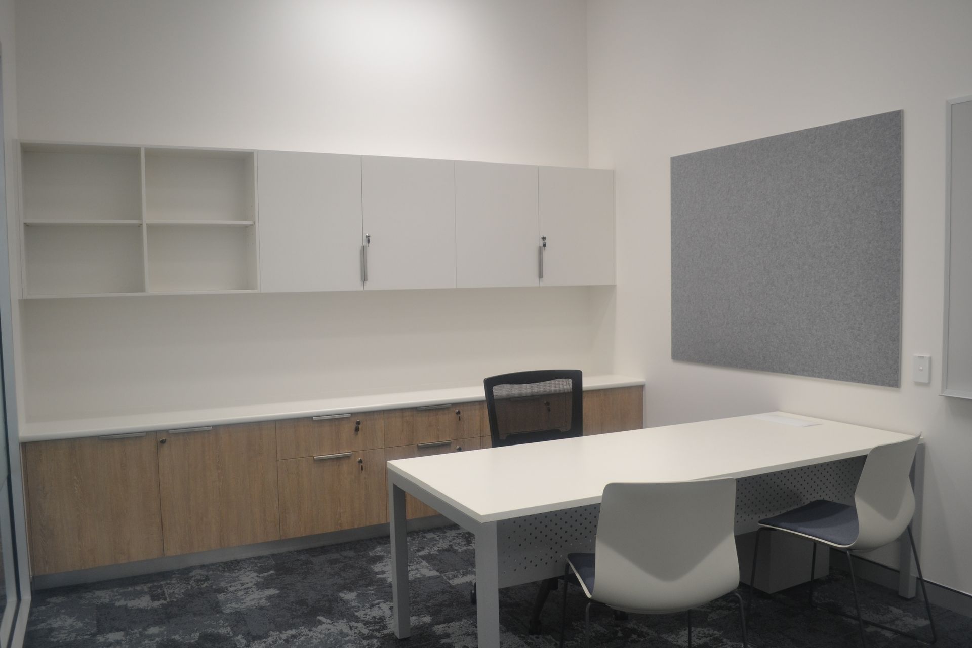 Office Features a White Desk With Two Chairs — Nick Favot Painting In Bohle, QLD