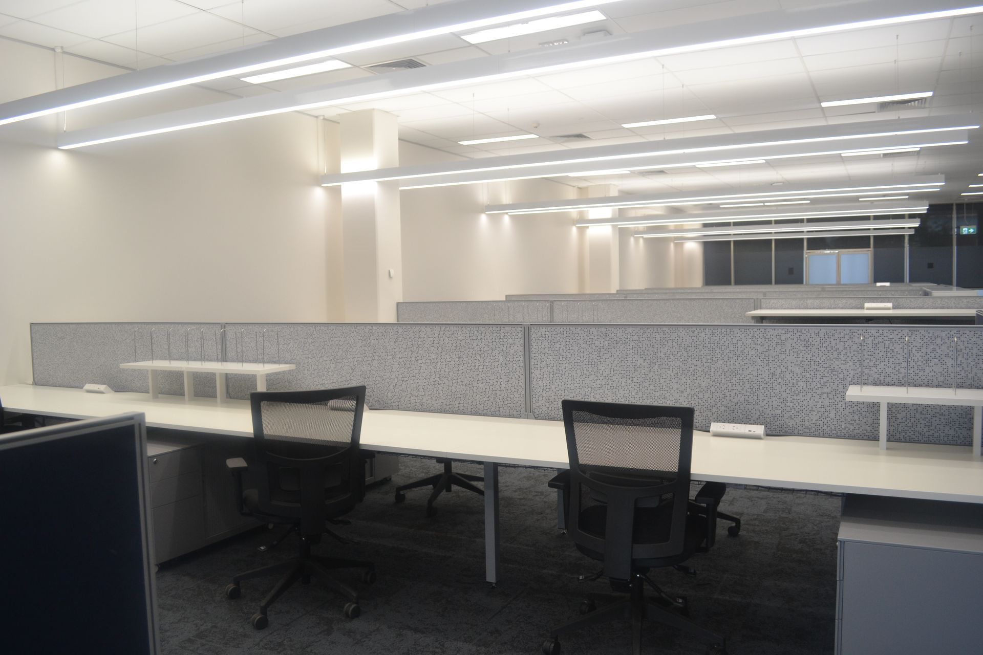 A Modern Office Space With Grey Cubicles — Nick Favot Painting In Bohle, QLD