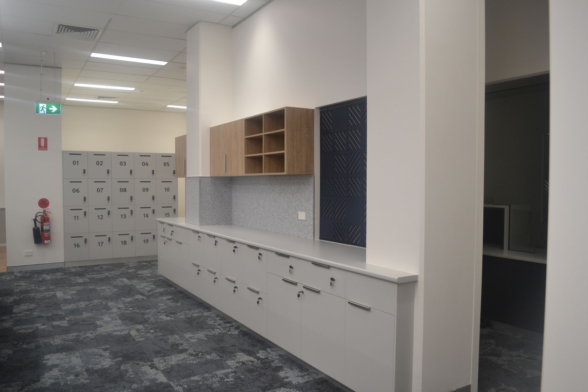 Modern Office Space With Numbered Lockers — Nick Favot Painting In Bohle, QLD