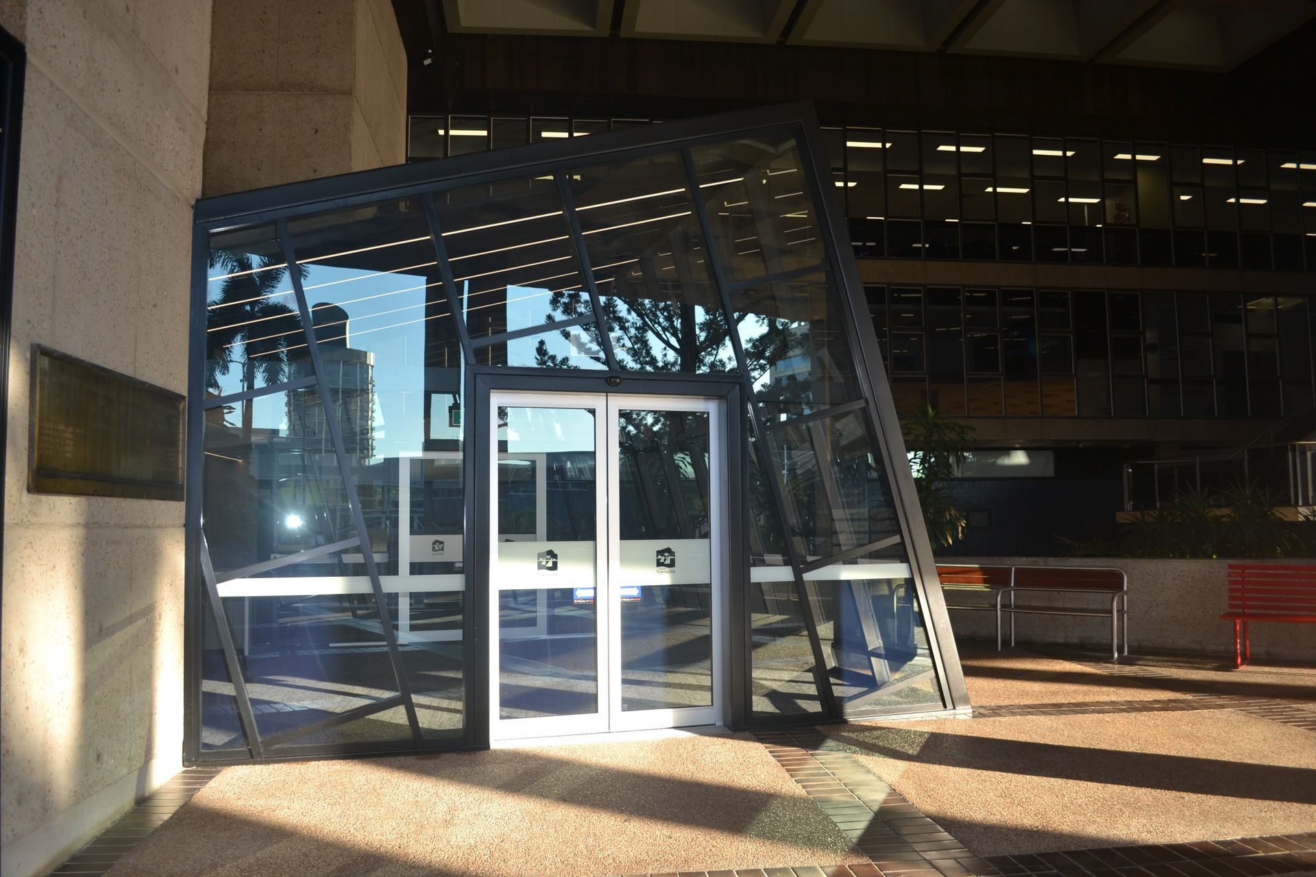 Slanted Glass Entrance With Bold Metal Framework — Nick Favot Painting In Bohle, QLD