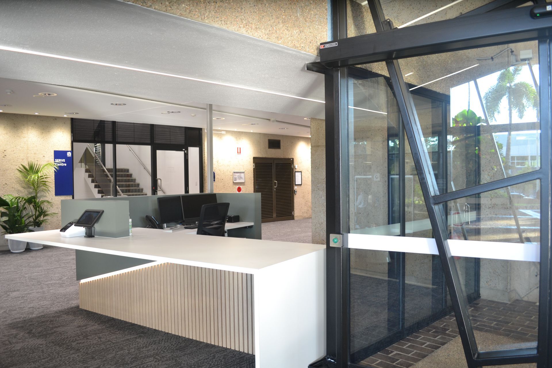 Reception Area With a Desk and Dual Computer Monitors — Nick Favot Painting In Bohle, QLD