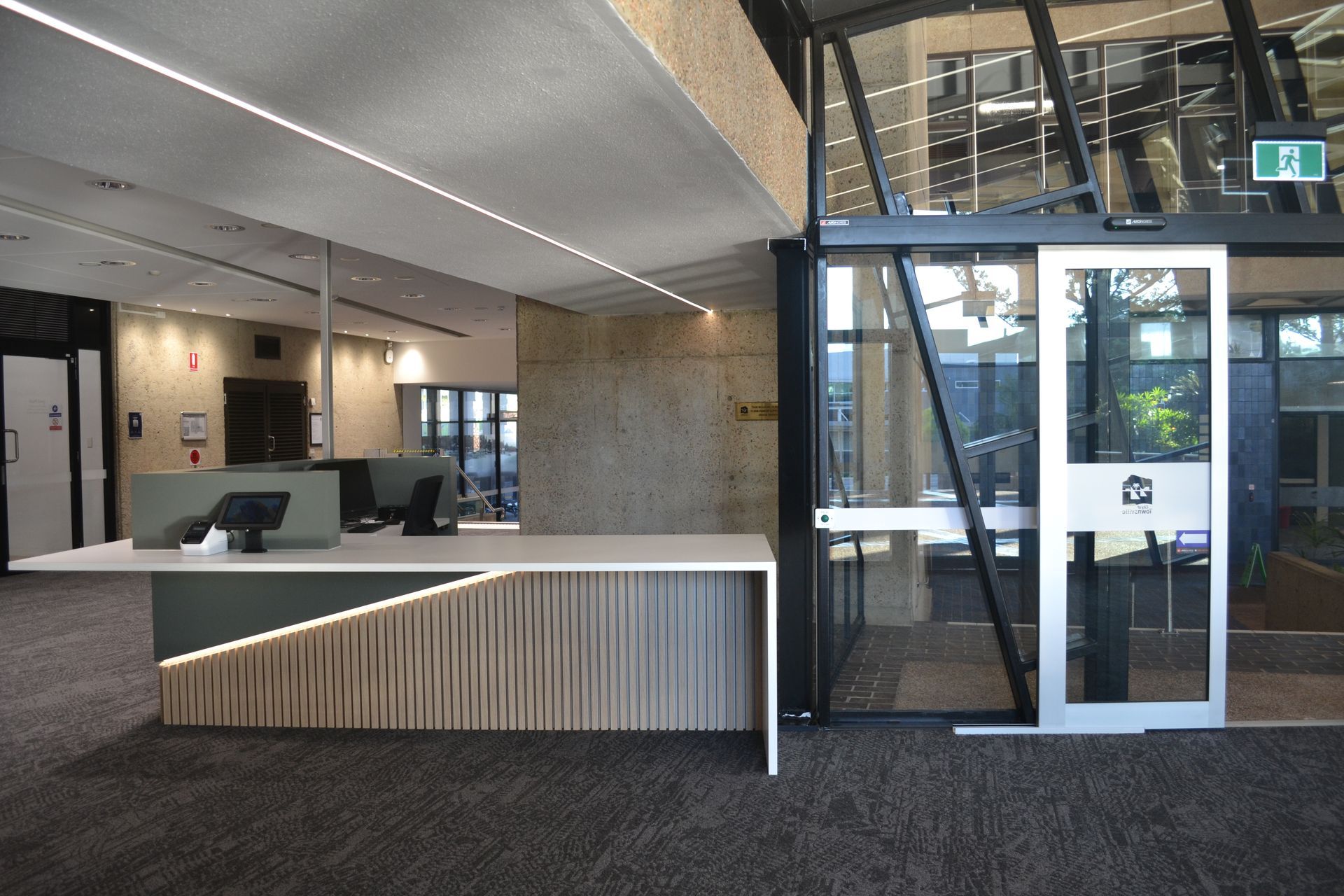 A Modern Office Lobby With a Sleek Reception Desk — Nick Favot Painting In Bohle, QLD