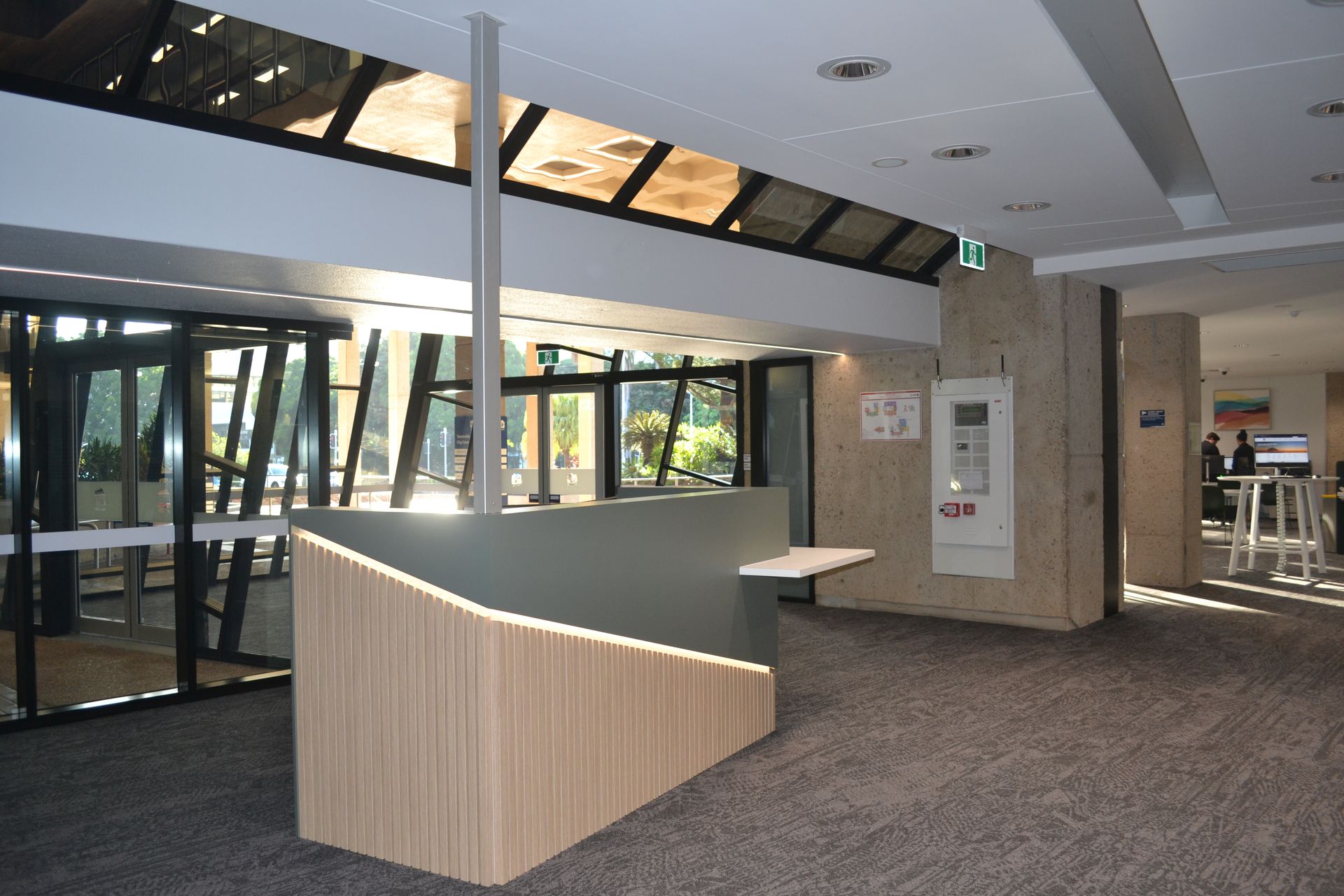 Office Lobby With Wood Desk and Glass Doors — Nick Favot Painting In Bohle, QLD