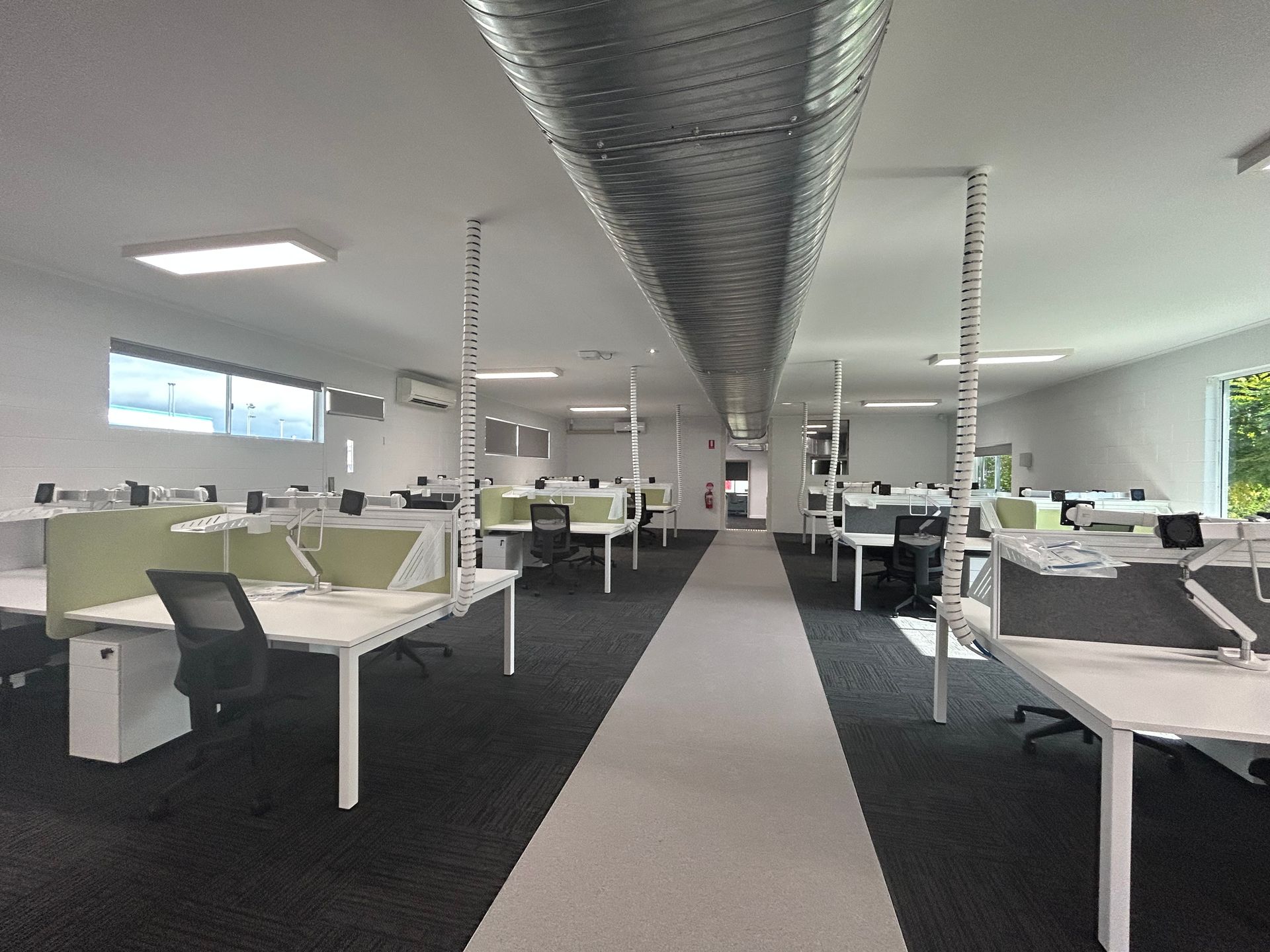 Office With Green Dividers, White Desks, and Black Chairs — Nick Favot Painting In Bohle, QLD