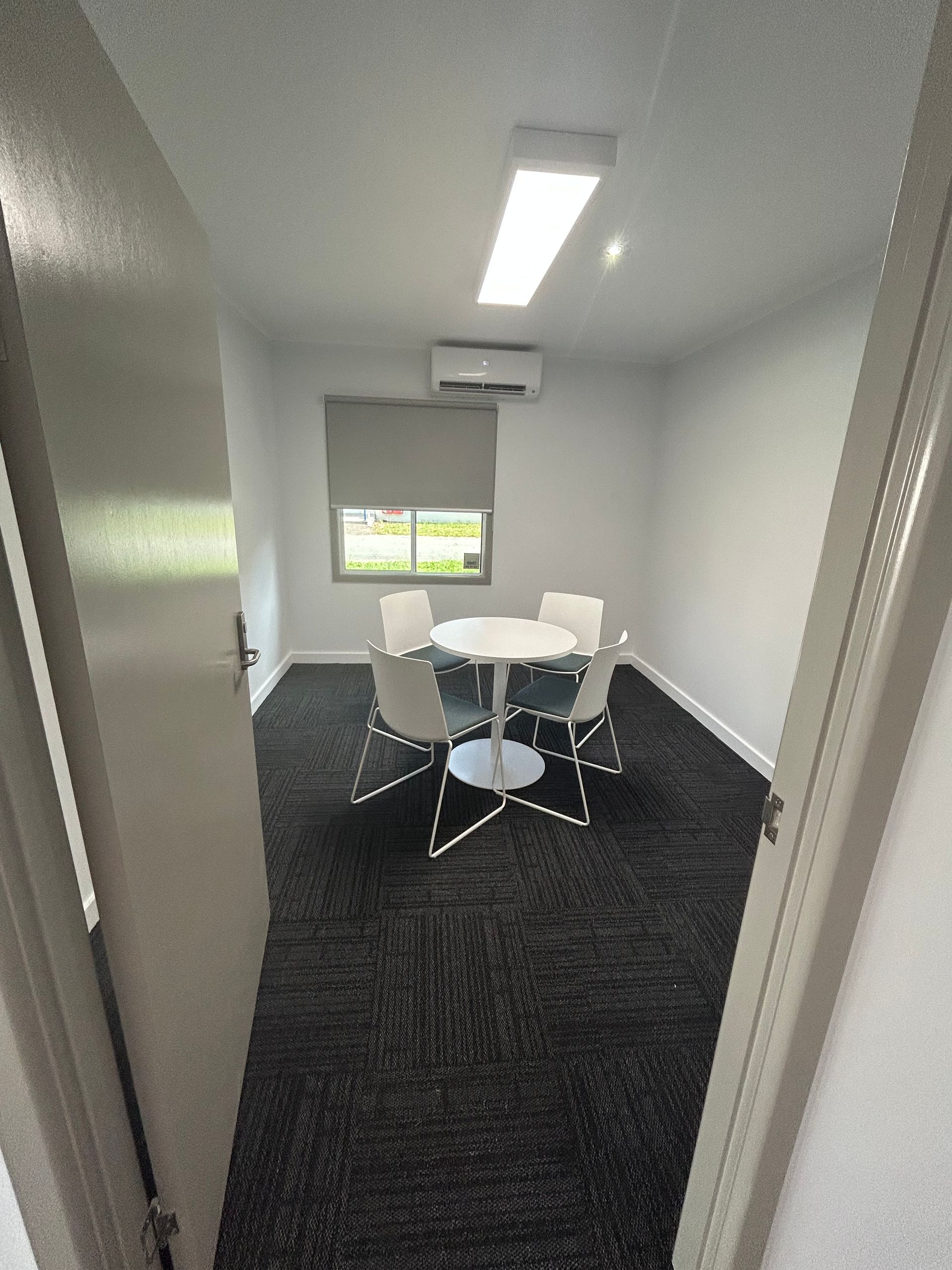 Room With a Round Table and Chairs — Nick Favot Painting In Bohle, QLD