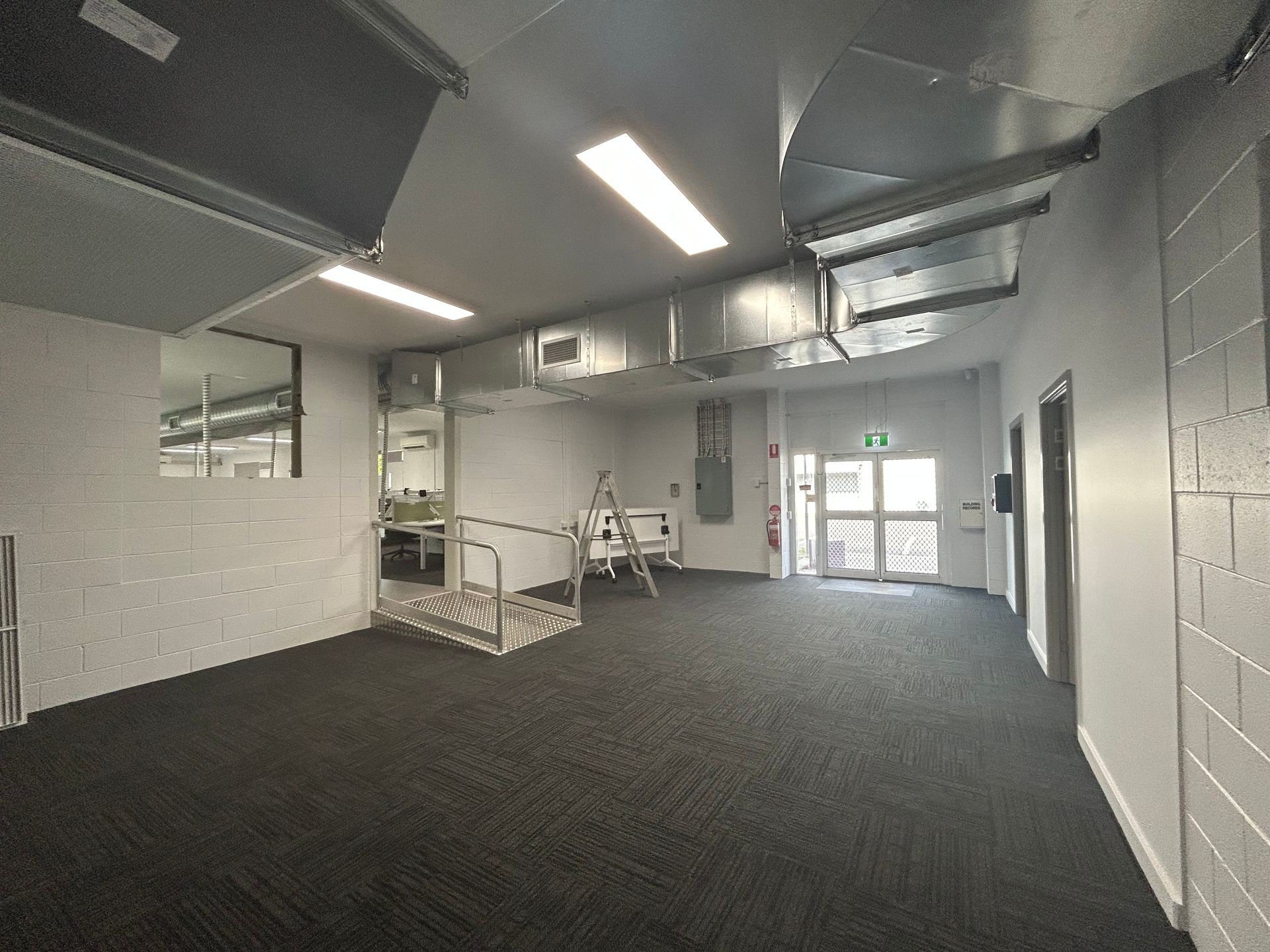 Industrial-style Room With Gray Walls and Dark Carpet — Nick Favot Painting In Bohle, QLD