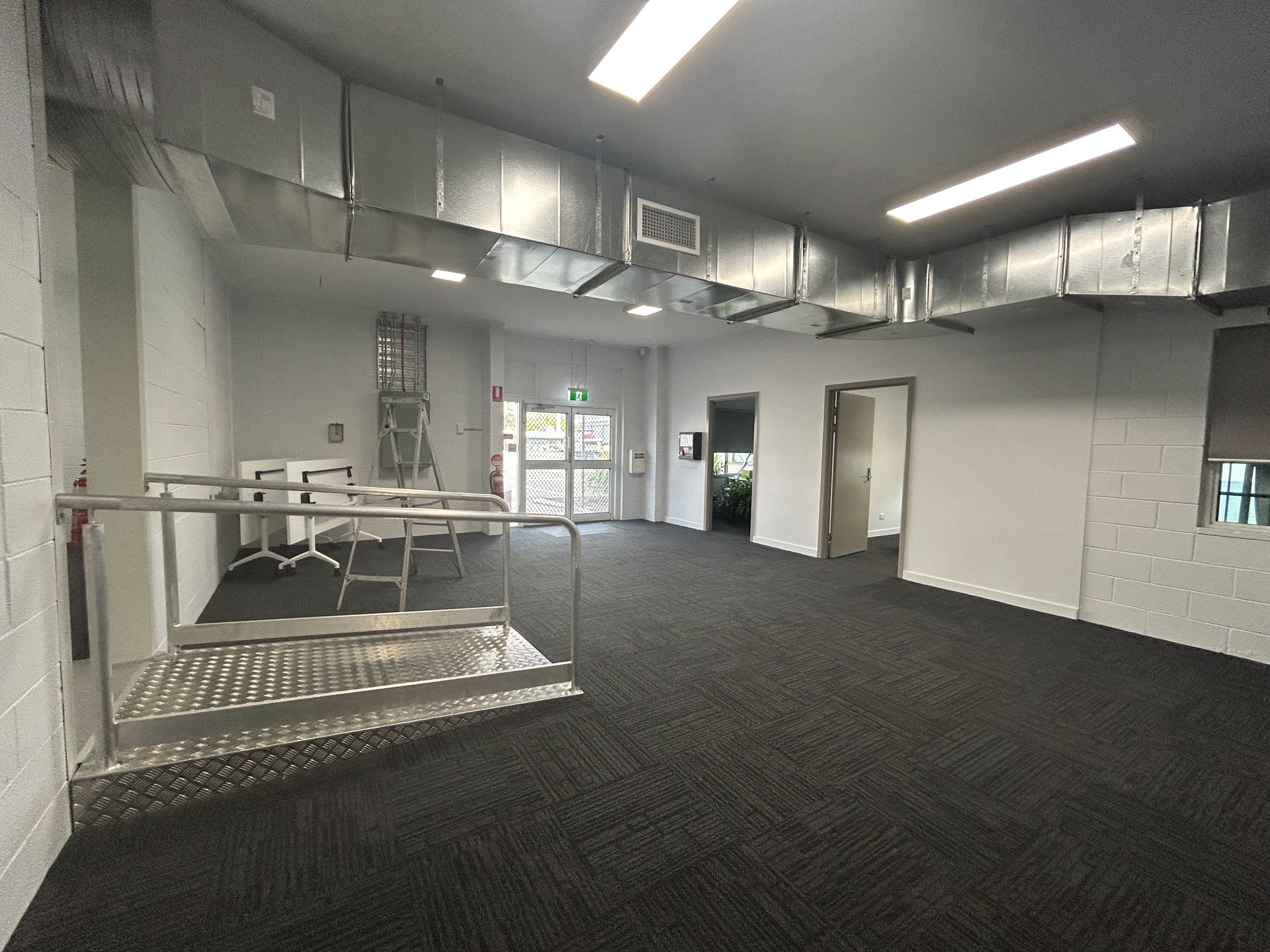 Spacious Room With Metal Ceiling Ducts — Nick Favot Painting In Bohle, QLD