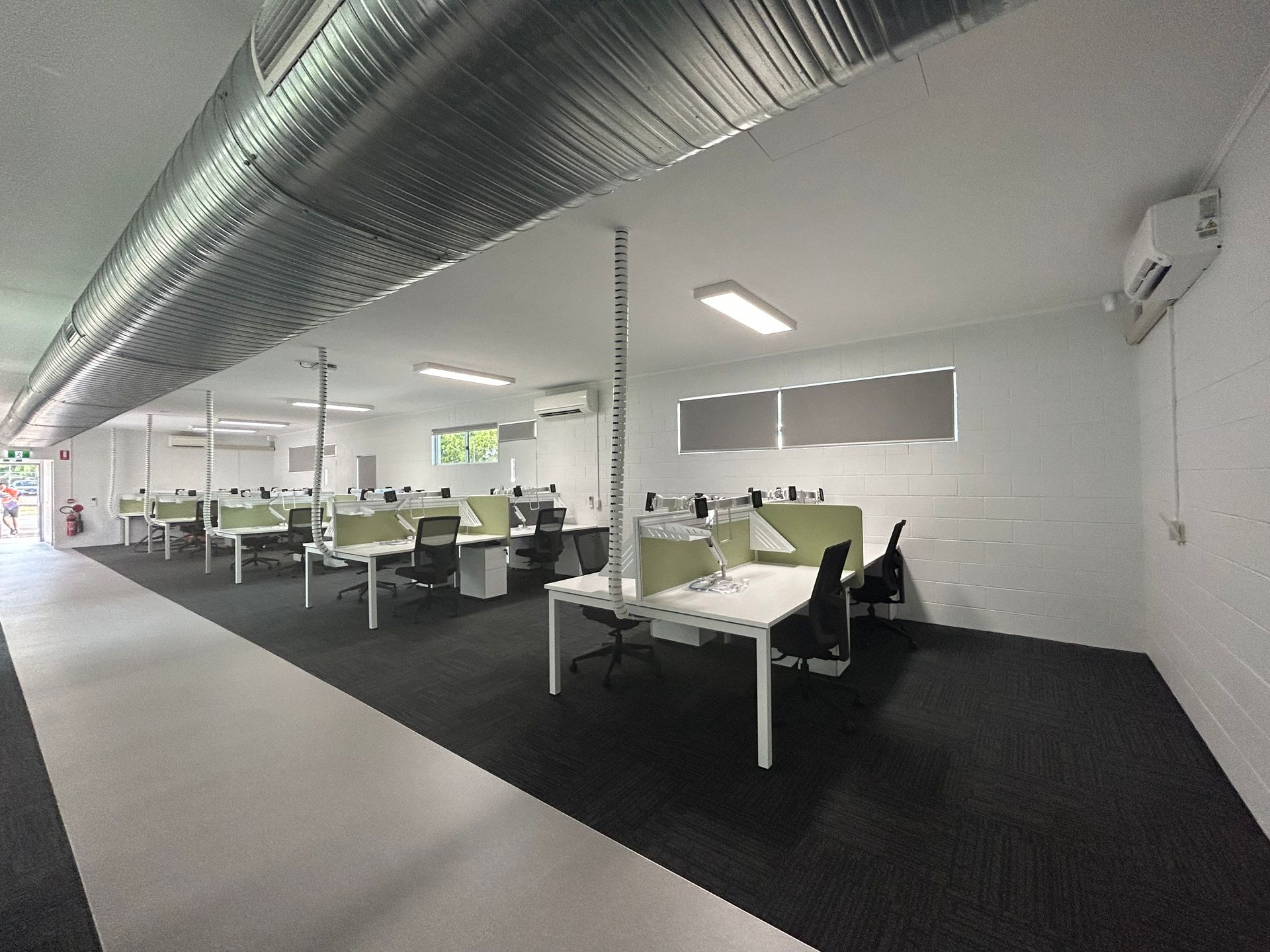 A Large Office With a Lot of Desks and Chairs — Nick Favot Painting In Bohle, QLD