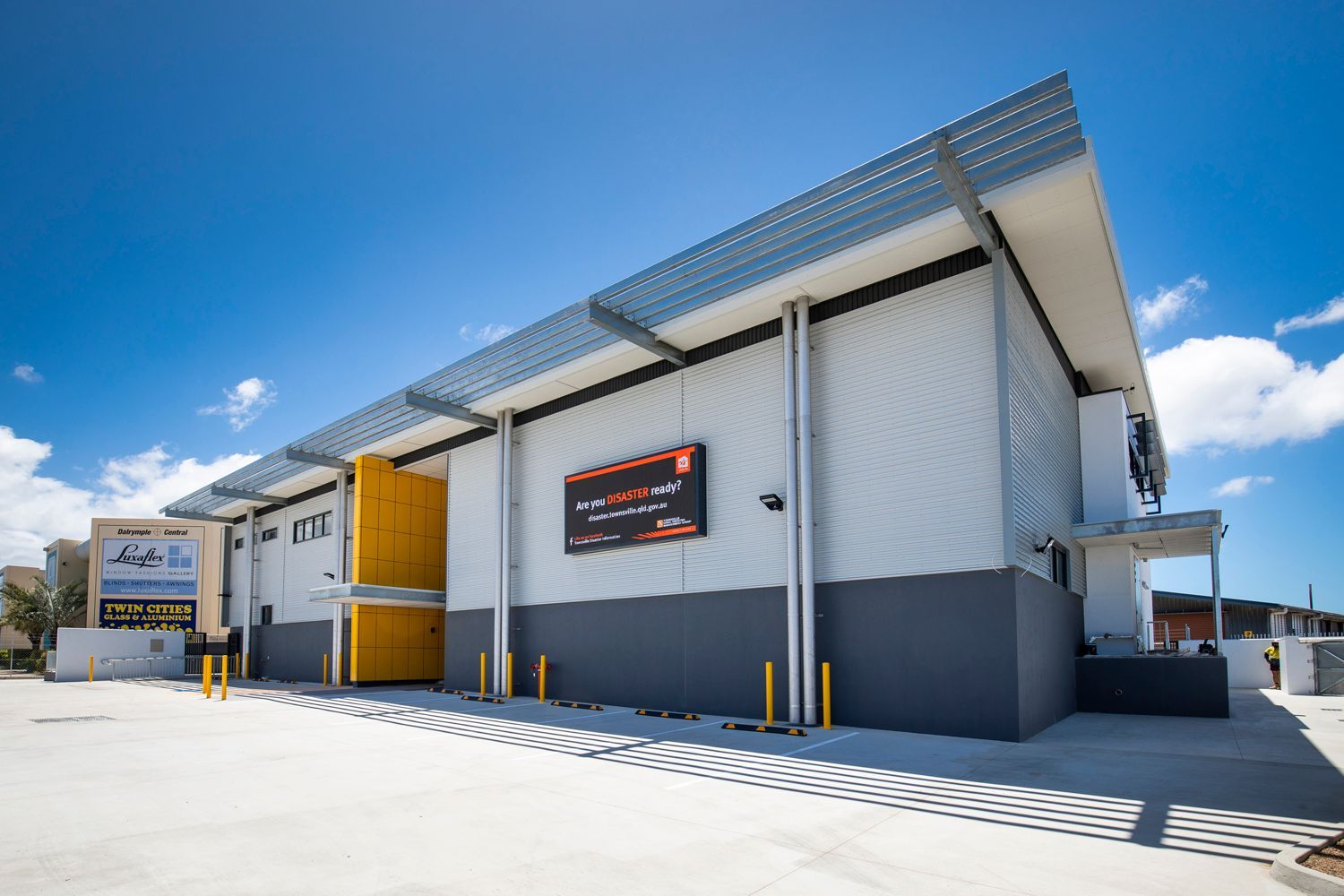 Modern Industrial Building Features a Large Sign — Nick Favot Painting In Bohle, QLD