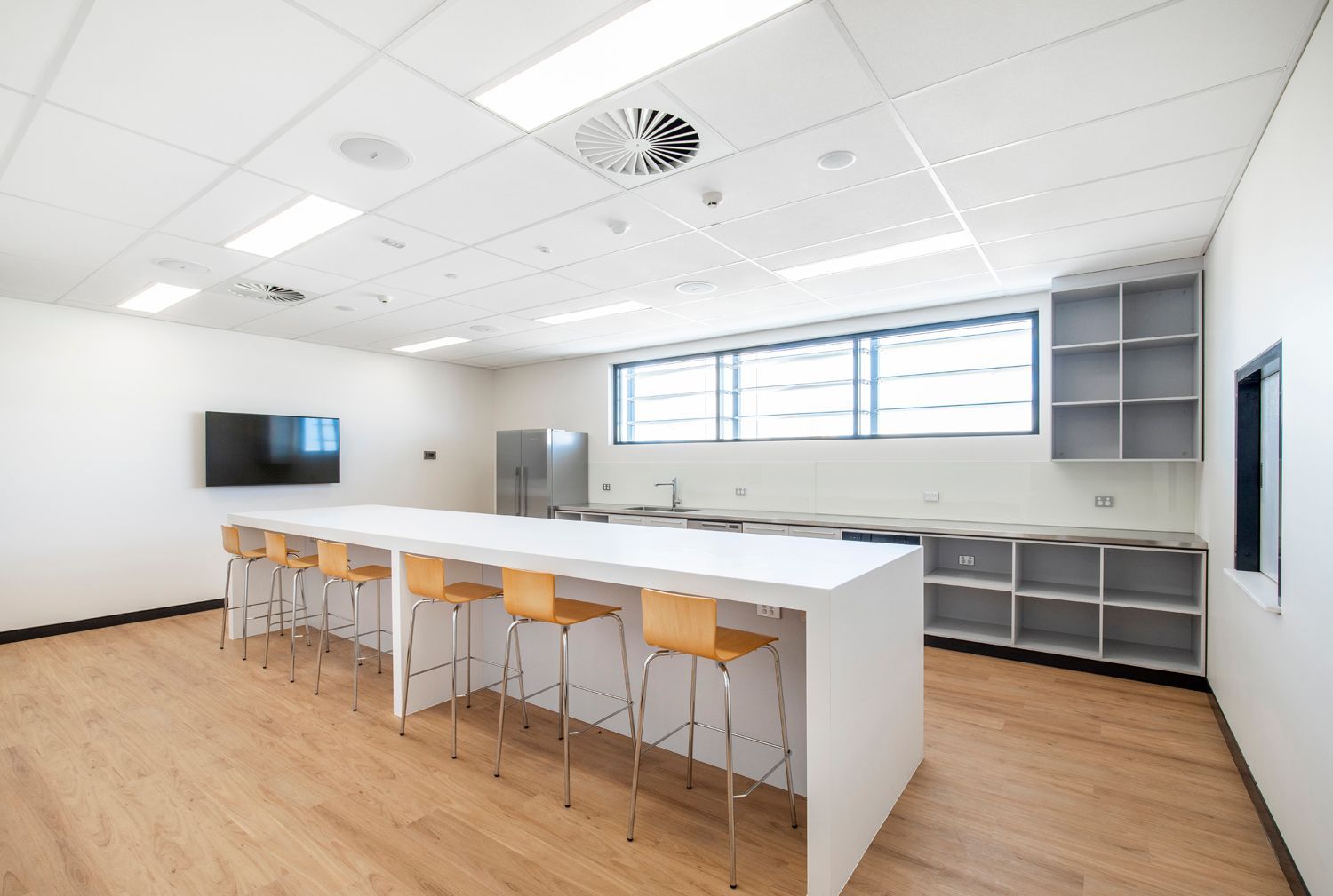 Modern Kitchen With Light Wood Floors — Nick Favot Painting In Bohle, QLD