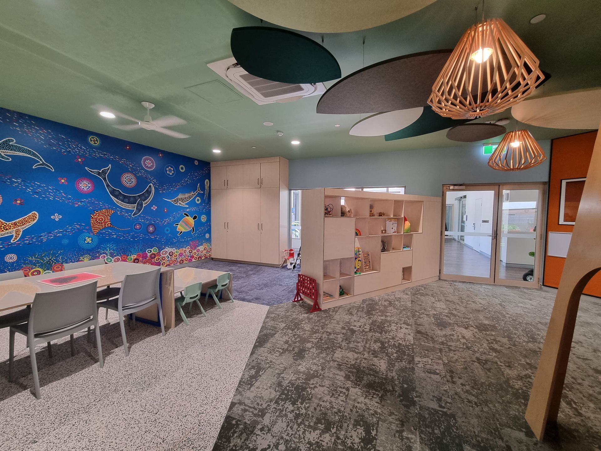 A Large Room With Tables and Chairs — Nick Favot Painting In Bohle, QLD