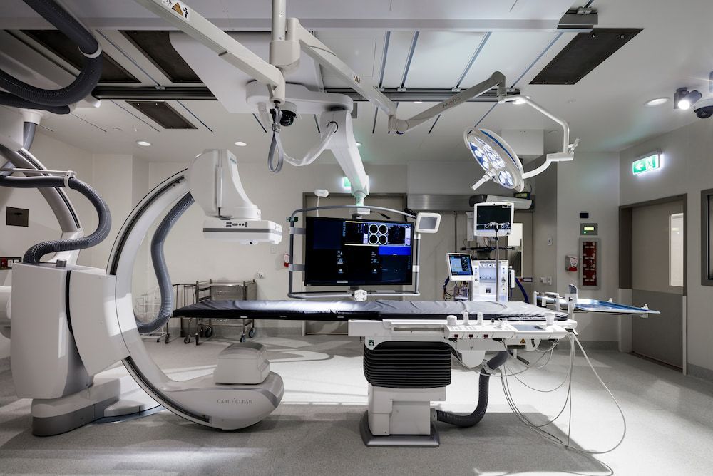 An Empty Operating Room With a Sign That Says Exit — Nick Favot Painting in Bohle, QLD