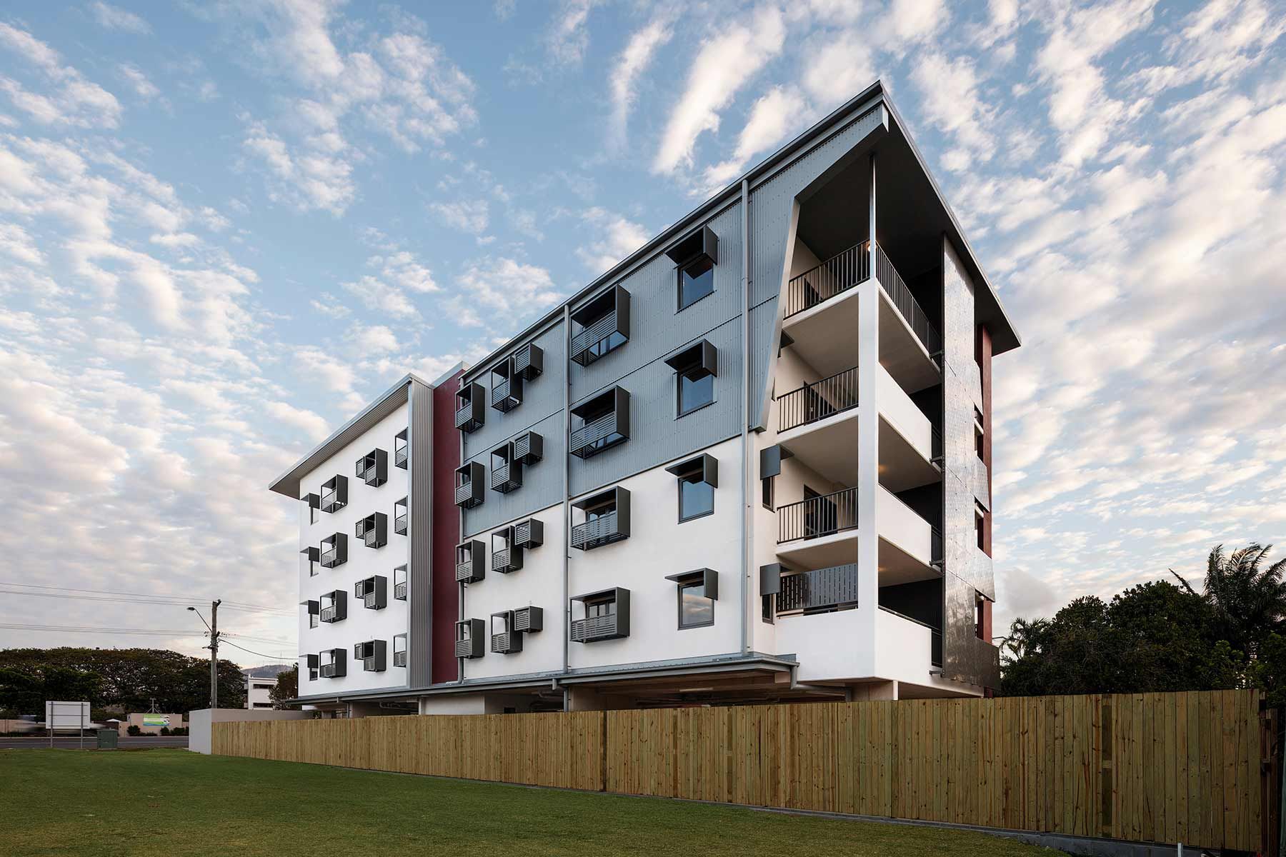 Modern Four-storey Building With Geometric Windows and Balconies — Nick Favot Painting In Bohle, QLD