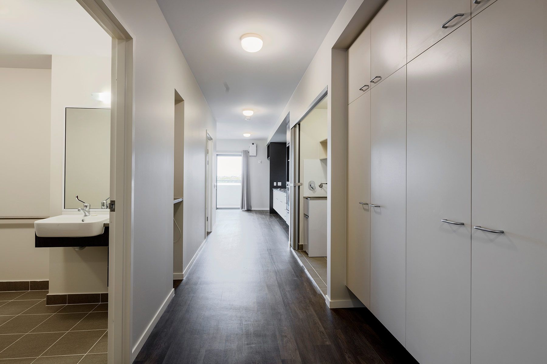 Modern Corridor With Dark Wood Flooring — Nick Favot Painting In Bohle, QLD