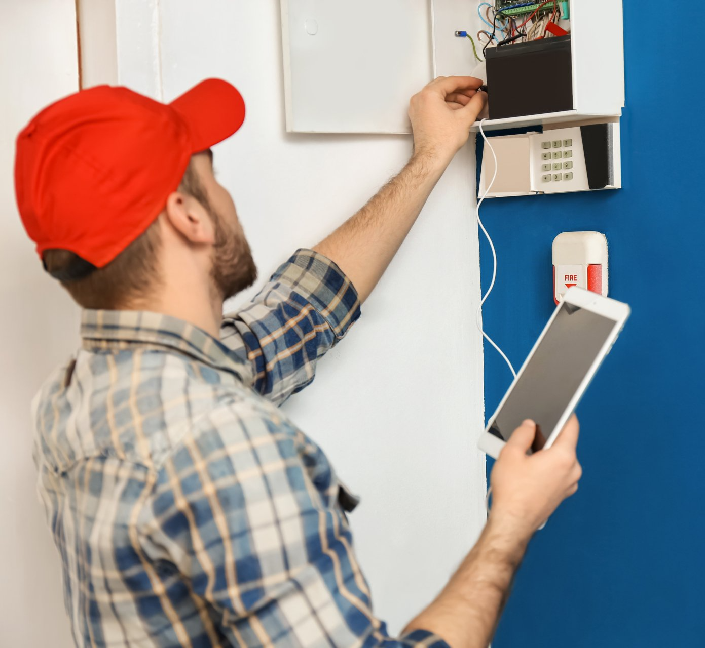 Inspector tests security and fire alarm systems