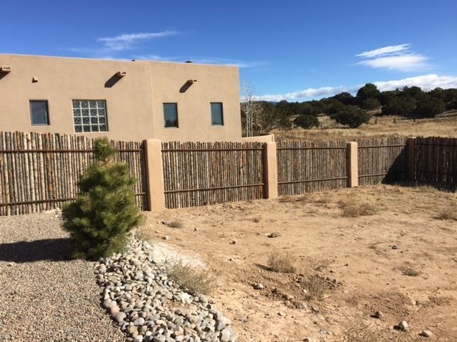 Pillars and coyote fence