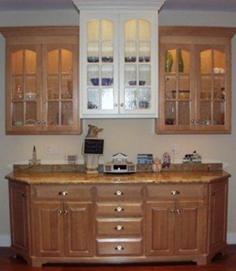 Cabinet Design — Maple Natural Wood Cabinet in Bristol, CT