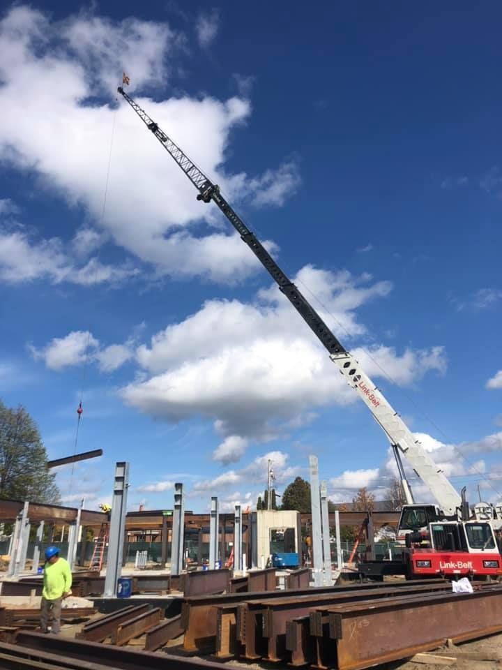 A Link-Belt crane assists construction workers in Vermont