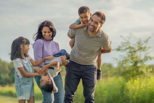 Stock image of four smiling professional women holding folders - Orlando, Florida - Law Office of Amber Johnson Stock image of four smiling professional women holding folders - Orlando, Florida - Law Office of Amber Johnson