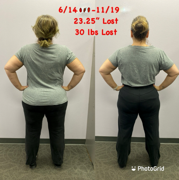 A woman is standing in front of a white board that says 30 lbs lost