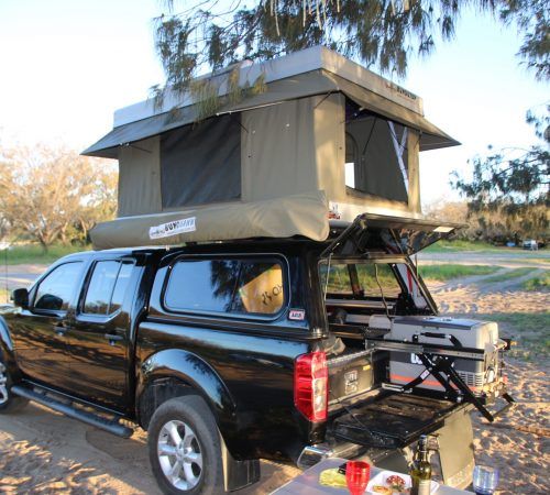 A Black Truck With a Tent on Top of It — Westlakes 4x4 Centre In Toronto, NSW