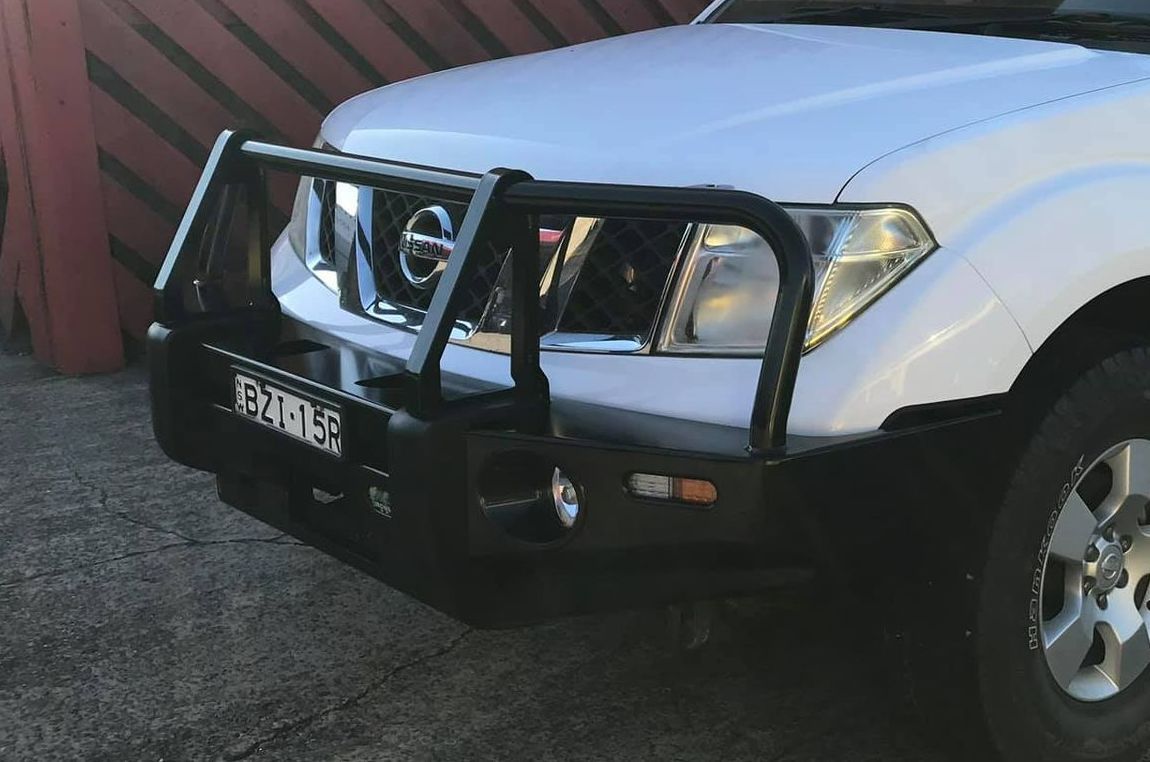 A White Nissan Pickup Truck With a Black Bumper — Westlakes 4x4 Centre in Singleton, NSW
