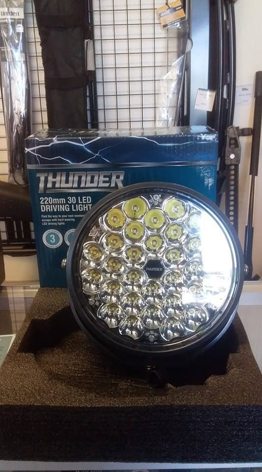 A Thunder Led Fog Light is Sitting on a Table Next to a Box — Westlakes 4x4 Centre in Cessnock, NSW
